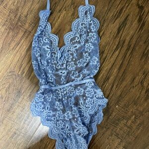 Sexy Blue Lace Lingerie Bodysuit with Intricate Floral Design